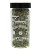 Jar of dried herbs with a black lid 