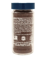 Jar of ground cloves with a blue lid 
