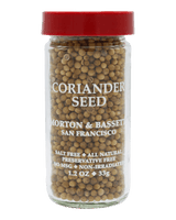 Jar of coriander seed with a red lid