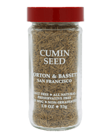 Jar of cumin seeds with a red lid 
