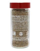 Jar of cumin seeds with a red lid 