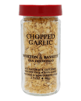 Jar of chopped garlic with red lid and Morton & Bassett branding 