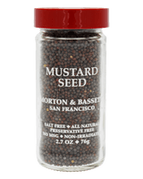 Glass jar of Morton & Bassett mustard seeds with red lid, labeled salt-free, all-natural, preservative-free, 2.7 oz.