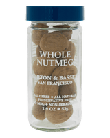Glass jar of Morton & Bassett whole nutmeg with blue lid, labeled salt-free, all-natural, preservative-free, 1.9 oz.