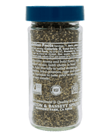 A clear plastic bottle of Rohnert Park Spice Co. seasoned black pepper with a blue cap, shown against a solid black background.