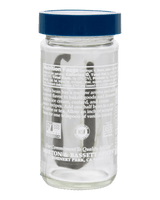 A clear glass jar with a dark blue screw-on lid, showing the back label of Morton & Bassett Spiced Vanilla Bean Sauce. The jar is photographed 