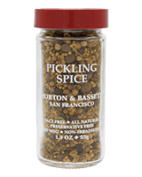 A clear plastic jar of Morton & Basset Pickling Spice from San Francisco, featuring a red lid and white text