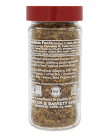 A clear plastic jar of Morton & Bassett Spices onion & bassett spices, showing the brown spice blend inside and the back label with nutrition facts