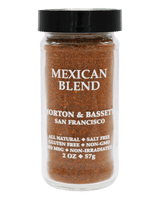 A 2 oz glass jar of Morton & Bassett Mexican Blend seasoning with a black lid