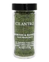 A clear glass jar of Morton & Bassett San Francisco Cilantro seasoning with a black lid