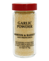 A 2.6 oz glass jar of Morton & Bassett Garlic Powder with a red lid