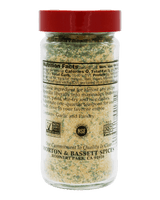 A bottle of Morton & Bassett Spices garlic and parsley seasoning, showing the back label with nutrition facts and NSF certification, topped with a red cap 