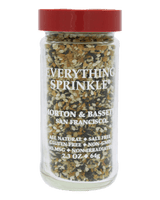 A clear plastic jar of Everything Sprinkle seasoning mix by Morton & Bassett, featuring a red lid