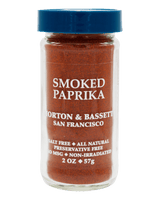 A 2 oz glass jar of Morton & Bassett Smoked Paprika seasoning with a blue cap