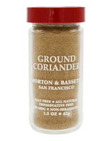 A clear plastic jar of Morton & Basset Ground Coriander seasoning with a red lid