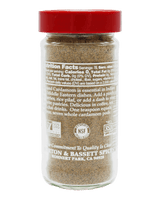 A clear plastic spice jar filled with brown ground spice, featuring a red screw-top lid and a white label with text and certification logos